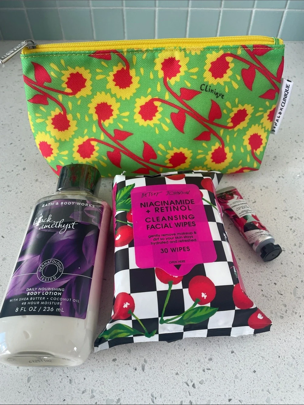 Bundle -Clinique Makeup bag, BBW lotion, Betsey Johnson face wipes, and lip balm